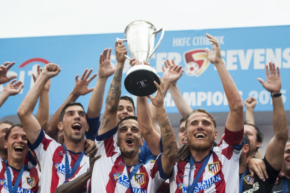 Atletico Madrid celebrate their win last year.