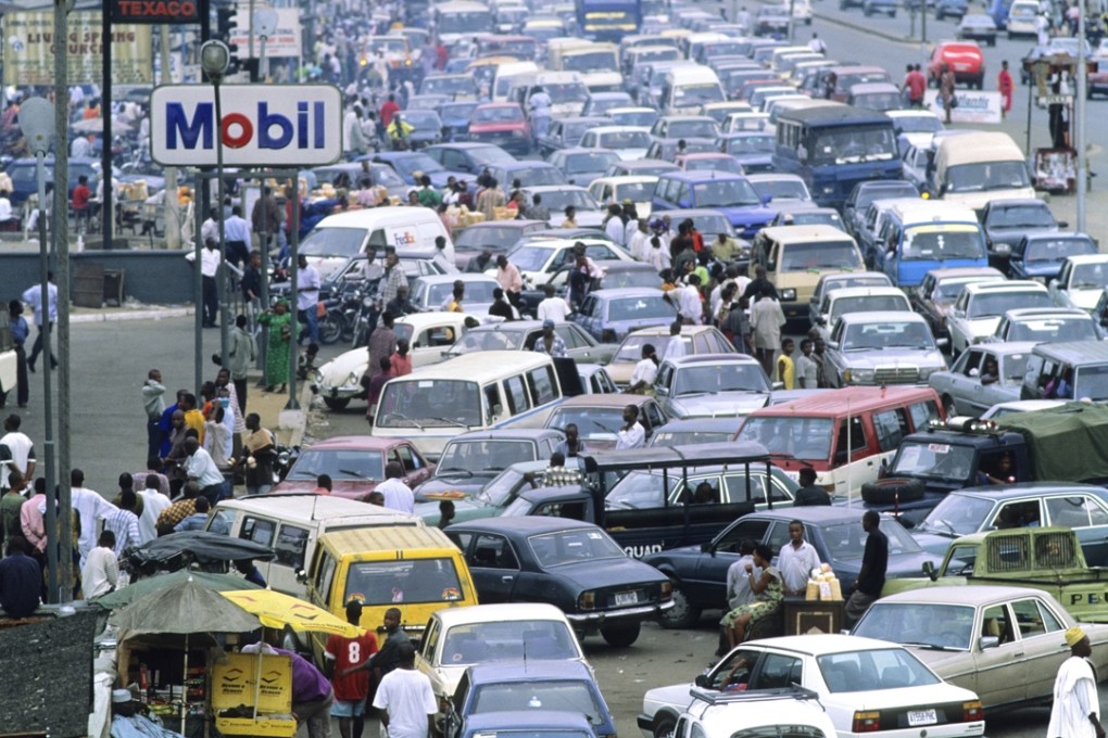 Queueing for petrol in Port Harcourt. The most enterprising drivers go the wrong way on a divided road to be in a shorter line. Photo: Corbis