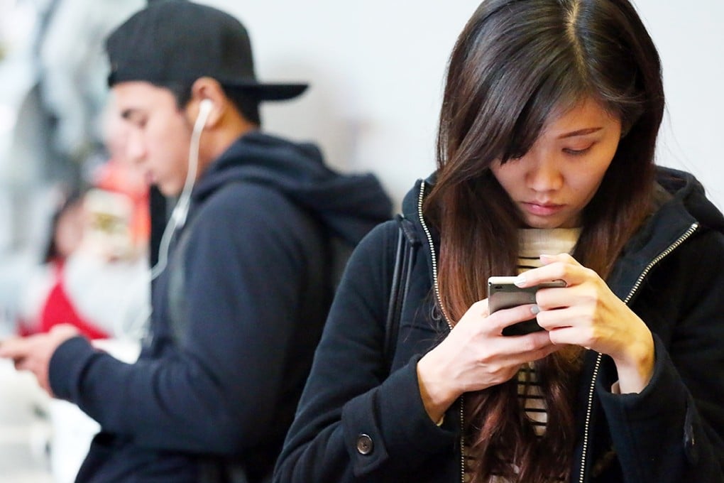 More people, in particular youngsters, are now watching programmes on mobile devices. Photo: Nora Tam