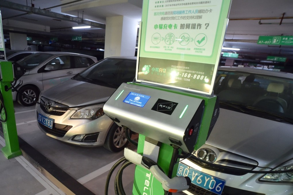 Electric cars at a charging station near Beijing West Railway Station. Premier Li Keqiang has called for further development of charging facilities on the mainland. Photo: Xinhua