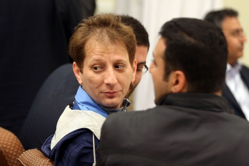 Tycoon Babak Zanjani is seen in a court, in Tehran. The 41-year-old has been convicted of fraud and economic crimes and sentenced to death. Photo: AFP