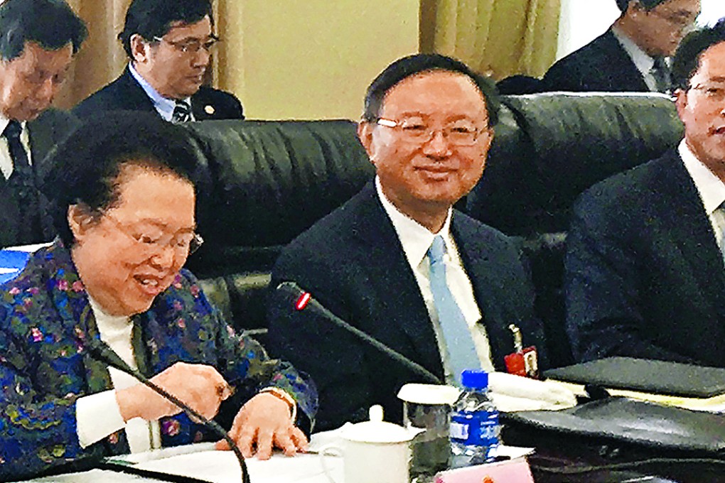 State Councilor Yang Jiechi with deputies from Hong Kong at the annual session of the NPC in Beijing. Photo: SCMP Pictures