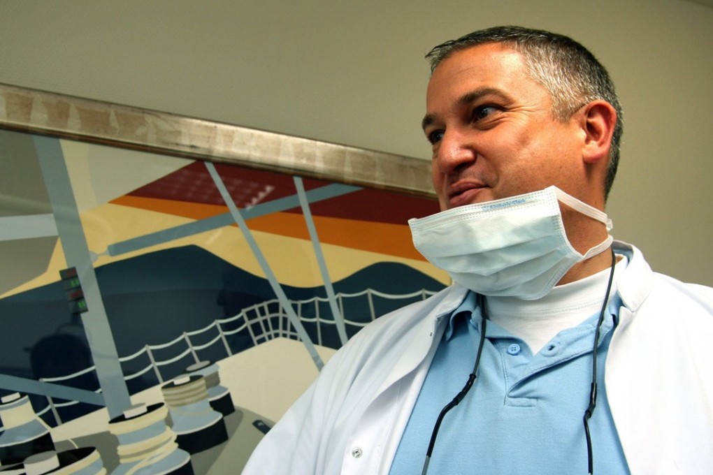 Dutch dentist, Jacobus Van Nierop,in his dental office in Chateau-Chinon, France. Photo: AP