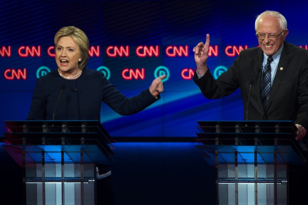 Democratic candidates Hillary Clinton, left, and Bernie Sanders face off in Flint Michigan in the final run-off to the presidential primaries. Photo: AP