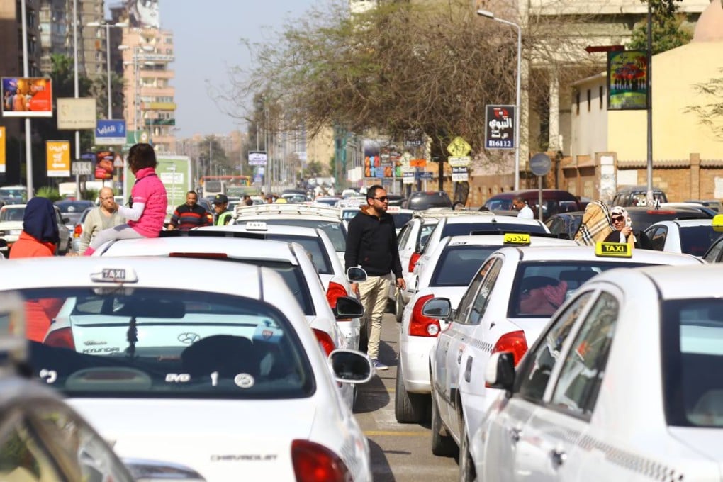 Egyptian taxi drivers protest in front of the Egyptian Council of State against popular taxi service operators Uber and Careem. Photo: Xinhua