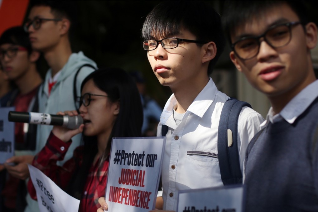 Scholarism members protest over the disappearance of several Hong Kong booksellers outside the US consulate in Hong Kong. Photo: Sam Tsang