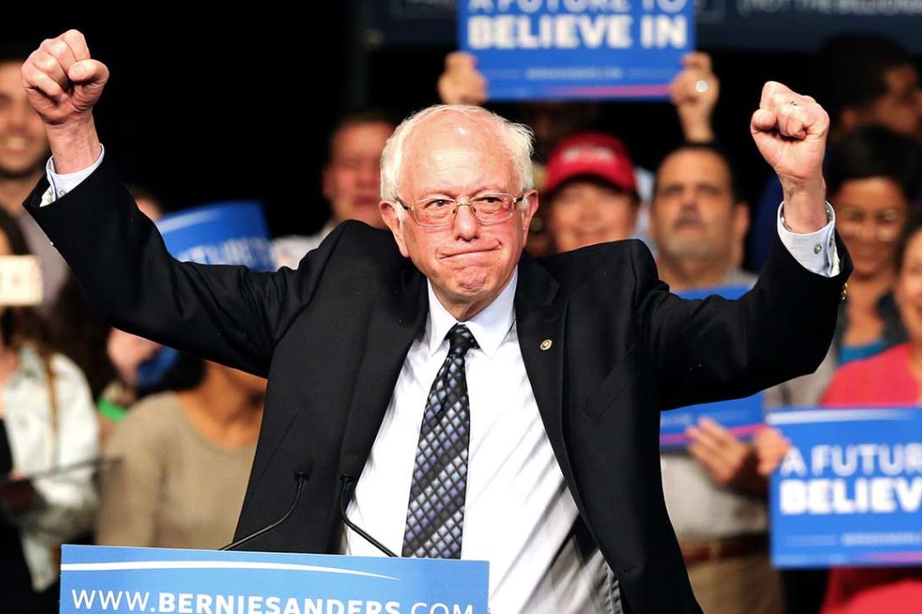 Democratic presidential candidate Senator Bernie Sanders acknowledges his supporters during a campaign event in Miami on Tuesday, after a surprising win in Michigan. Photo: Tribune News Service