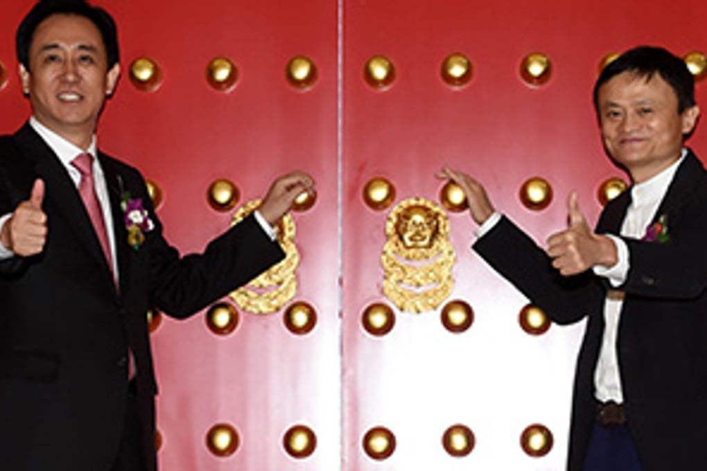 Hui Ka-yan and Jack Ma announce Guangzhou’s IPO last November. Photo: Xinhua