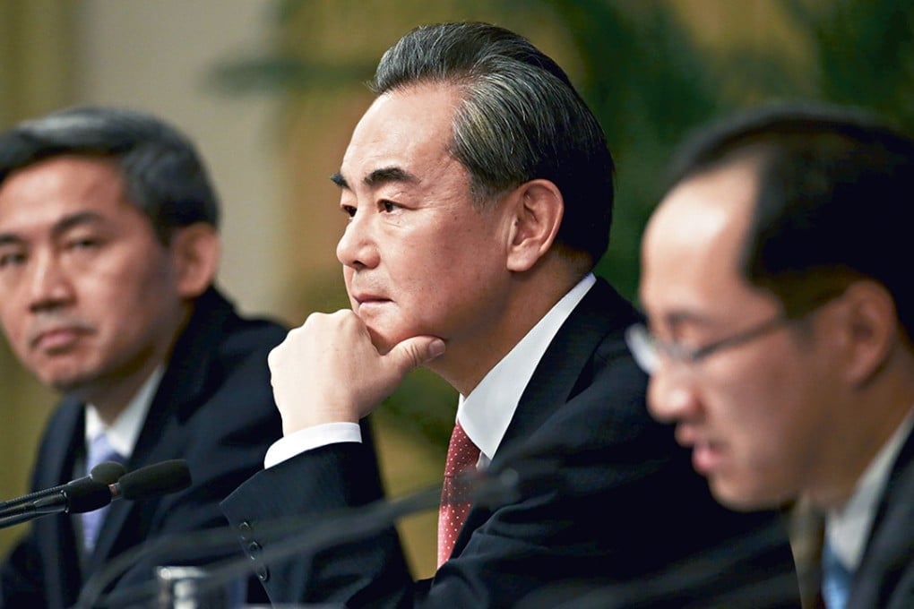 China's Foreign Minister Wang Yi attends a news conference on the sidelines of the National People's Congress in Beijing. Photo: Reuters