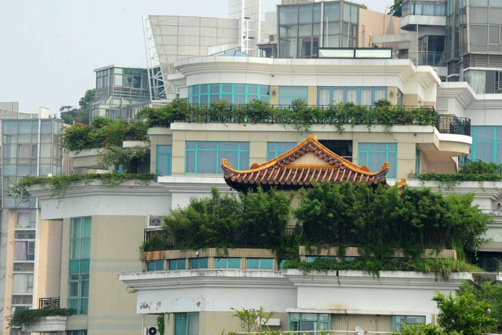 A temple on the roof of a 21-storey apartment building in Shenzhen. Photo: AFP