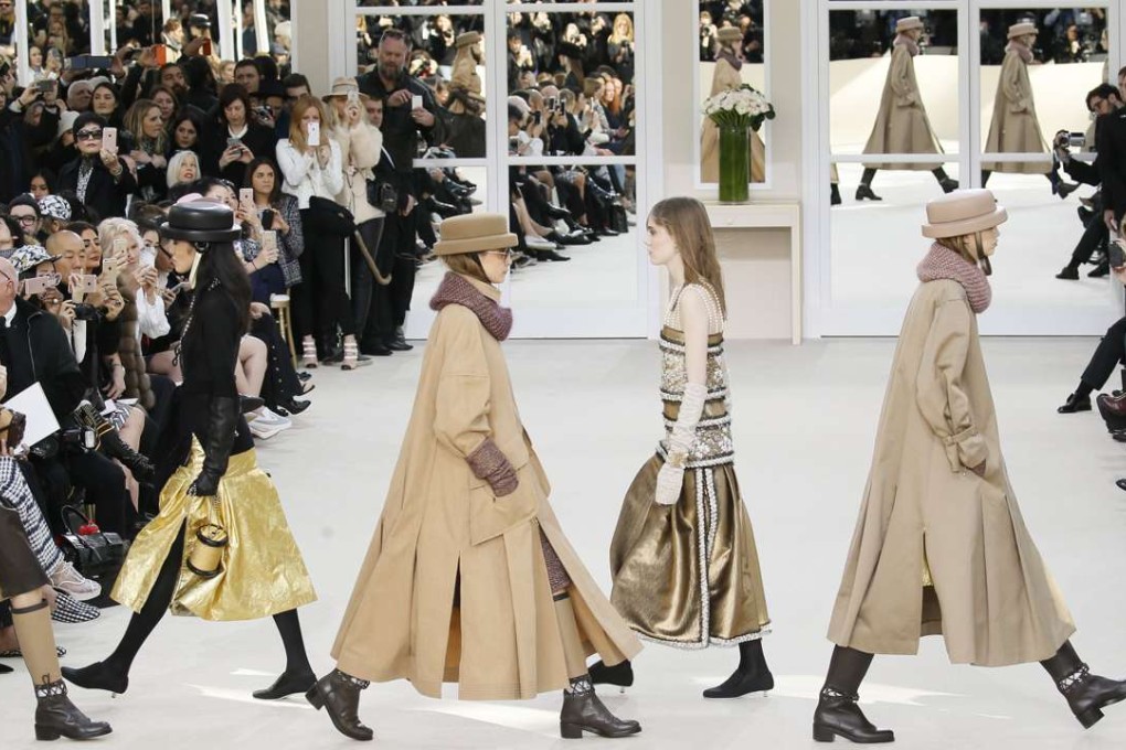Models present creations by German designer Karl Lagerfeld as part of his auturn-winter 2016-17 women's ready-to-wear collection for Chanel at the Grand Palais in Paris. Photo: Reuters