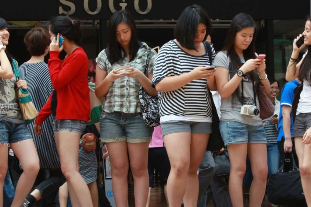 People look at their phones on average 150 times a day, according to some reports, and Alibaba doesn’t plan on getting left behind as more advertisers migrate to a mobile-first policy. Photo: SCMP Pictures