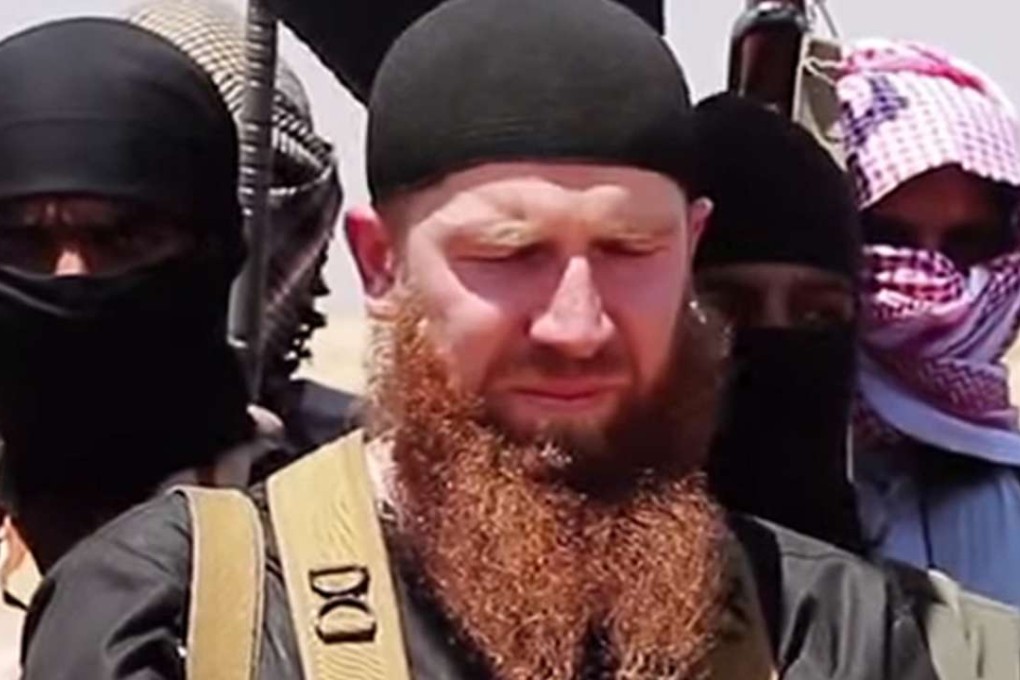 Omar al-Shishani, who is believed to be the equivalent of a war minister for the Islamic State jihadist group, is pictured in an unknown location in Syria. Photo: AFP