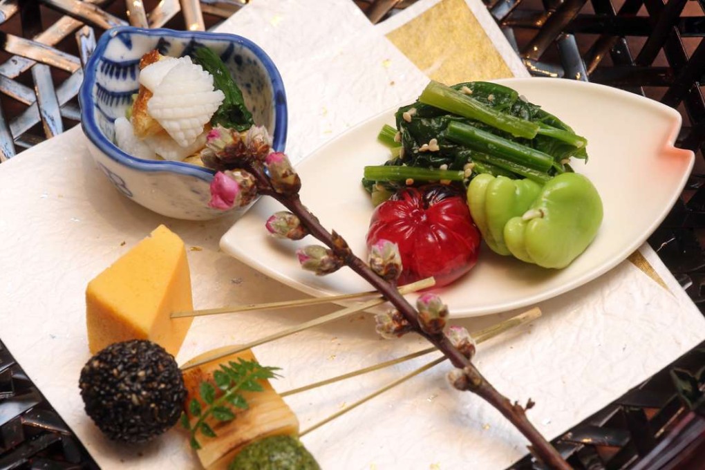 Hassun course (Welsh onion and sake-cooked squid, spinach with sesame, myrtle jelly, broccoli ball, sesame ball, steamed egg) at Kashiwaya in Central. Photos: K.Y. Cheng