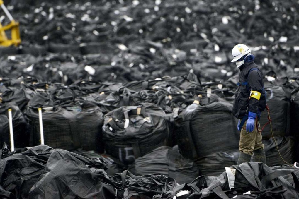 Bags containing waste materials generated during decontamination works in the northeastern Japan town of Tomioka, adjacent to the crippled Fukushima Daiichi nuclear plant. Photo: Kyodo