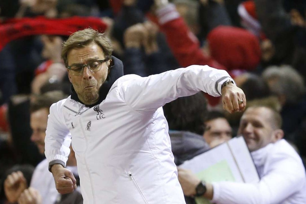 Liverpool manager Juergen Klopp celebrates after Roberto Firmino nets his team’s second goal in the 2-0 defeat of Manchester United. Photo: Reuters
