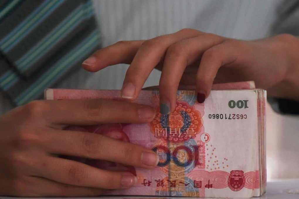China’s banks extended 726.6 billion yuan in new yuan loans last month, down from 2.51 trillion yuan in January. Photo: AFP