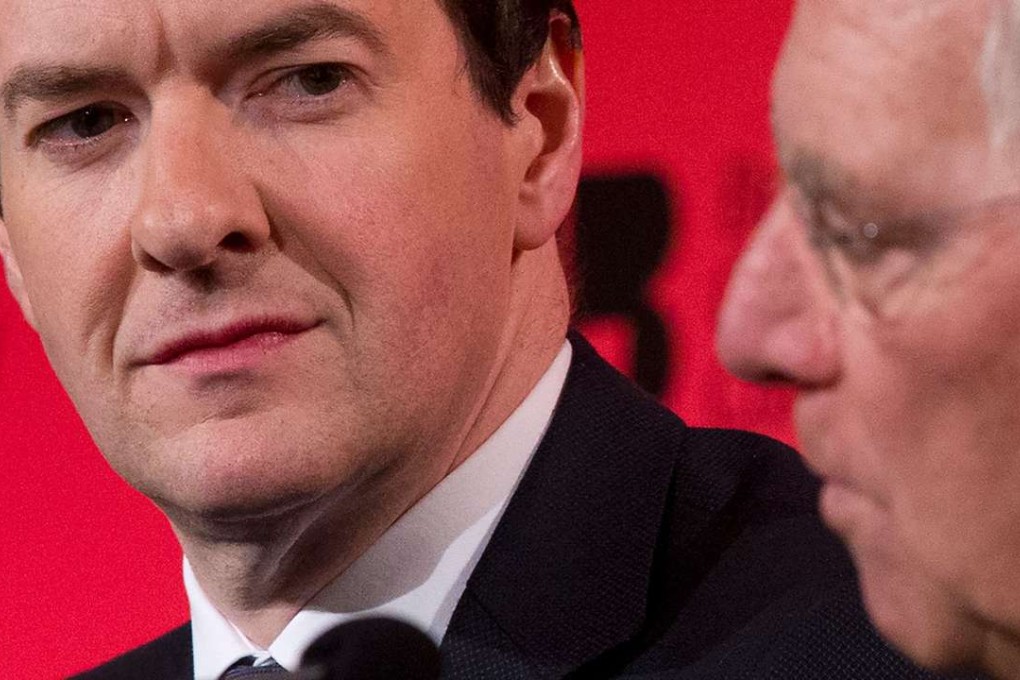 British Chancellor of the Exchequer George Osborne (left) and German Finance Minister Wolfgang Schaeuble speak at the British Chambers of Commerce conference in London. The EU would be ”less stable” if Britain voted to leave, Schaeuble told British business leaders. Photo: AFP