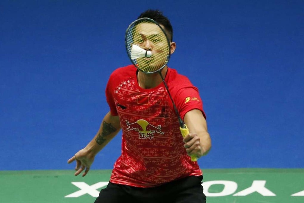 Lin Dan in action against Dane Jan Jorgensen during their quarter-final. Photo: Reuters