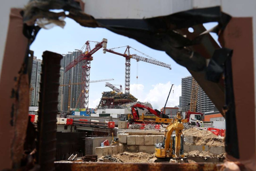 The West Kowloon terminus is stlll under construction as controversy swirls around whether mainland officers will be stationed there. Photo: Felix Wong