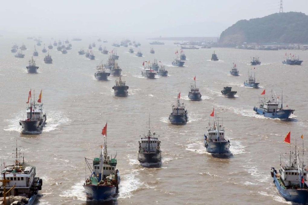 Boats set out from Zhoushan, Zhejiang province, for the fishing grounds of the East China Sea. Photo: Xinhua