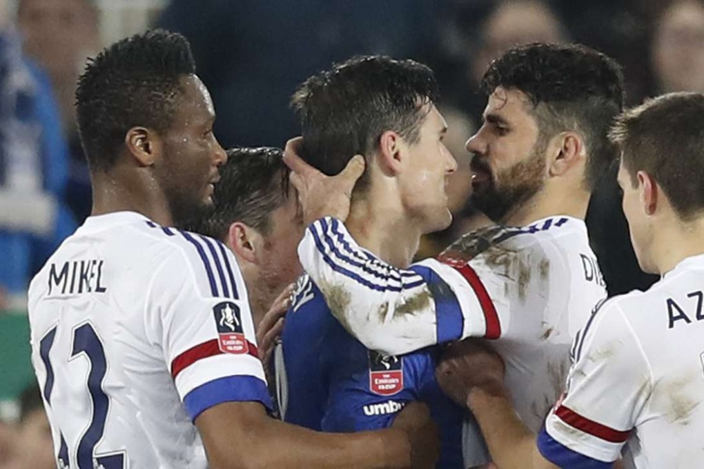 Chelsea's Diego Costa clashes with Everton's Gareth Barry before being sent off . Photo: Reuters