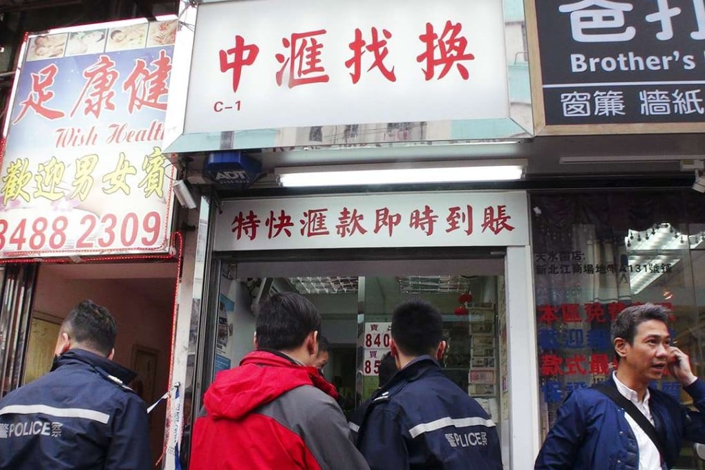 The money exchange shop in Wan Tau Street, Tai Po, where the owner was killed in an apparent robbery. Photo: SCMP Pictures