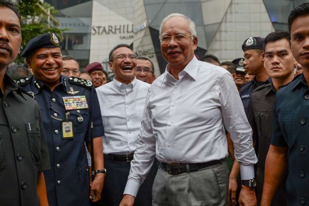 Malaysia’s Prime Minister Najib Razak (centre). Photo: AFP