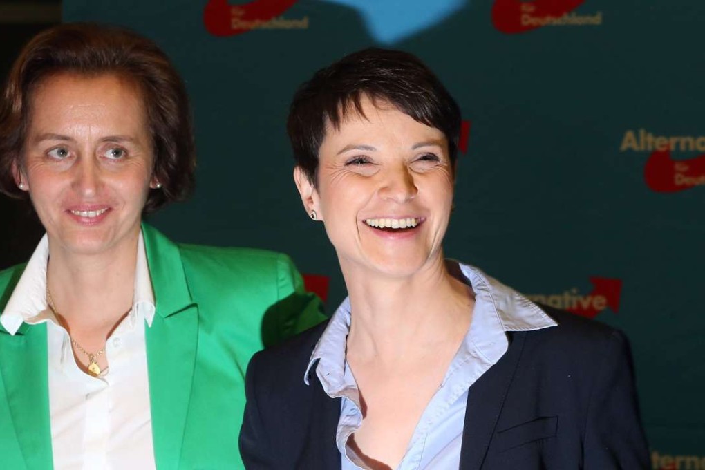 'Alternative for Germany' chairwoman Frauke Petry (right) and her deputy, Beatrix von Storch, celebrate after the party’s strong showing in state parliamentary elections on Sunday. Photo: EPA