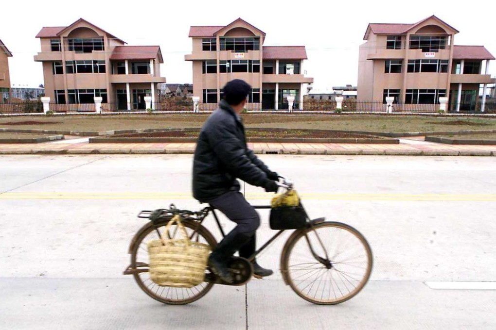 China had 718 million square metres of unsold commercial housing space at the end of last year, 15.6 per cent more than in 2014, data shows. Photo: AFP