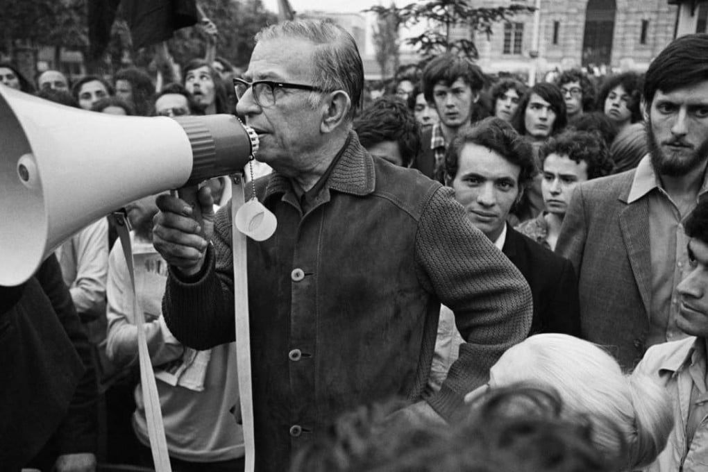 French existentialist philosopher, writer and political activist Jean-Paul Sartre and left-wing protesters demonstrate against racism. Photo: Corbis