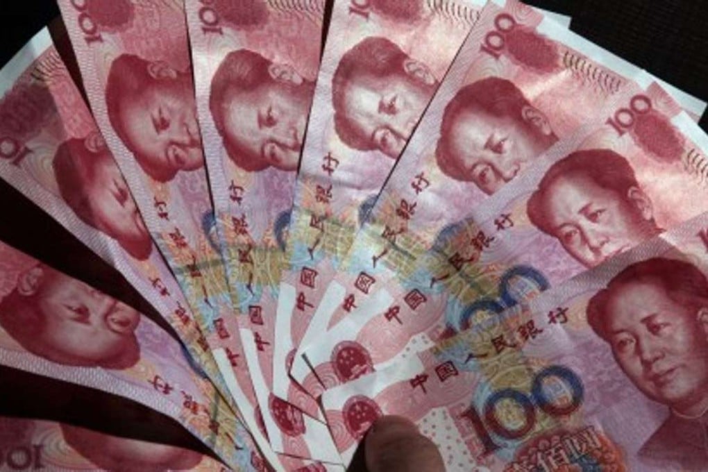 A former primary school student who stole 10 Chinese cents from her classmate more than 40 years ago tried to hand 10,000 yuan to her when they met again on Sunday. Photo: EPA