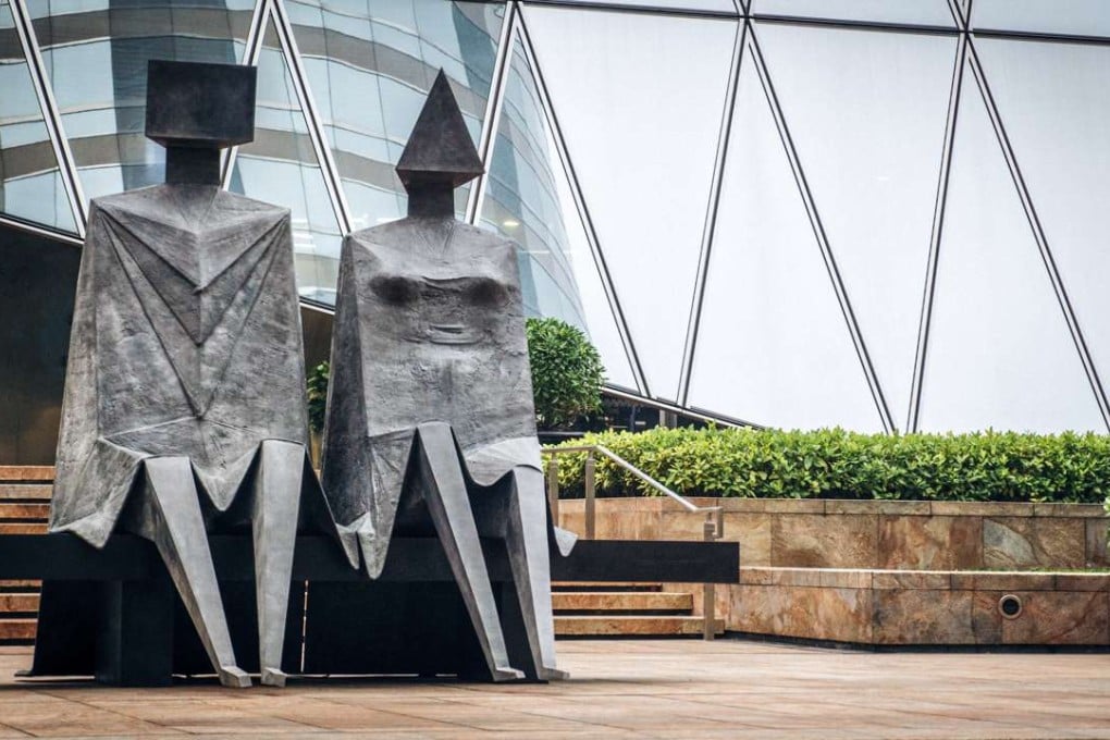 British sculptor Lynn Chadwick’s bronze sculpture Sitting Couple, 1989-1990, on display outside Exchange Square, Central. Photo: Stuart Howe/Courtesy McNamara Art Projects