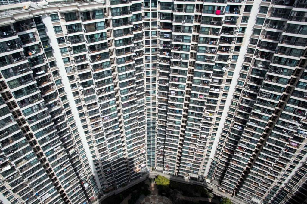 A residential high rise building in Shanghai on March 15, 2016. Photo: AFP
