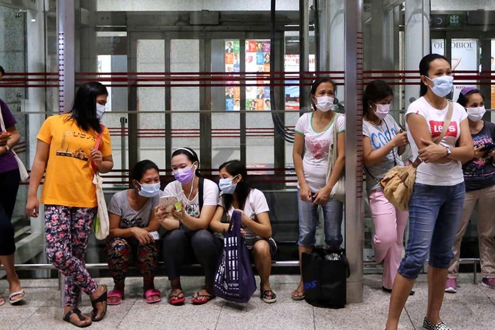 Domestic helpers in Hong Kong usually spend time in public places on their day off. Photo: Sam Tsang