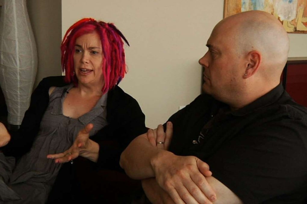 Philosophers only ask us to challenge “reality” as an intellectual exercise. Only rebels, fanatics and visionaries like the Wachowskis (pictured) would try to live the challenge. Picture courtesy of A Company Films, LLC production.