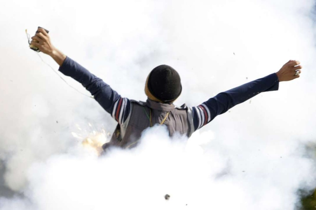 Tuesday’s shoot-out followed a challenge by security forces to a group of unknown men to identify themselves, during an operation to comb through a forested area of Poso. Photo: EPA