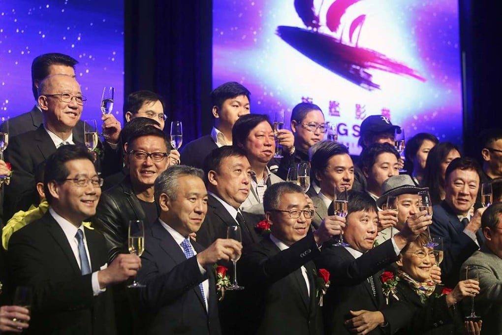 Movie heavyweights toast the joint venture in Hong Kong yesterday. They said it was the first cultural exchange of its kind. Photo: Sam Tsang