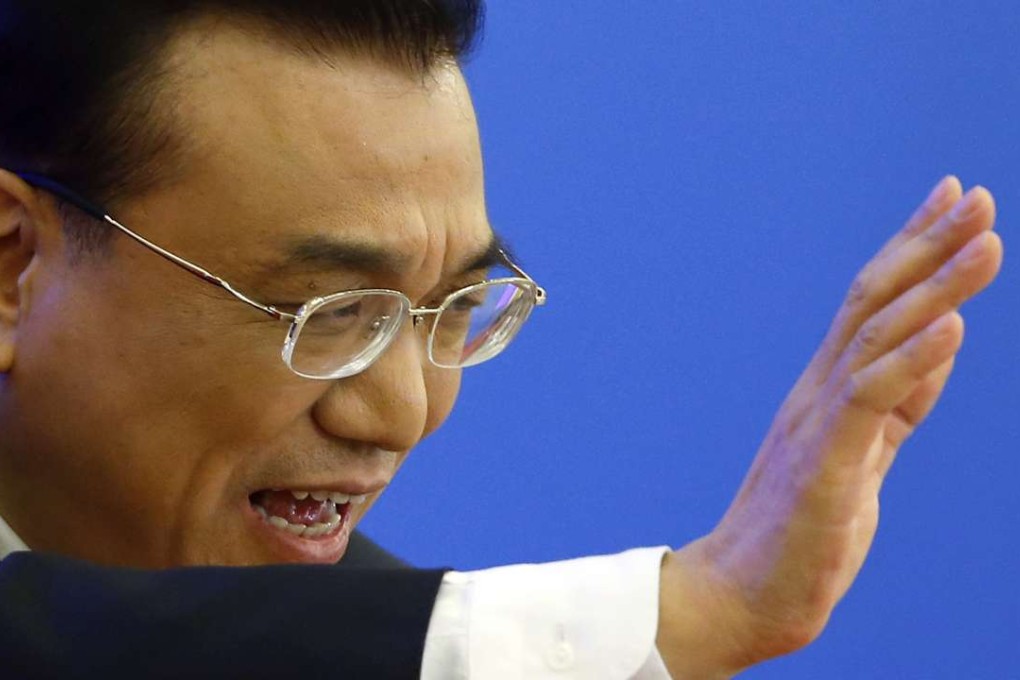 China's Premier Li Keqiang waves as he leaves a news conference after the closing ceremony of the National People's Congress on Wednesday. Photo: Reuters