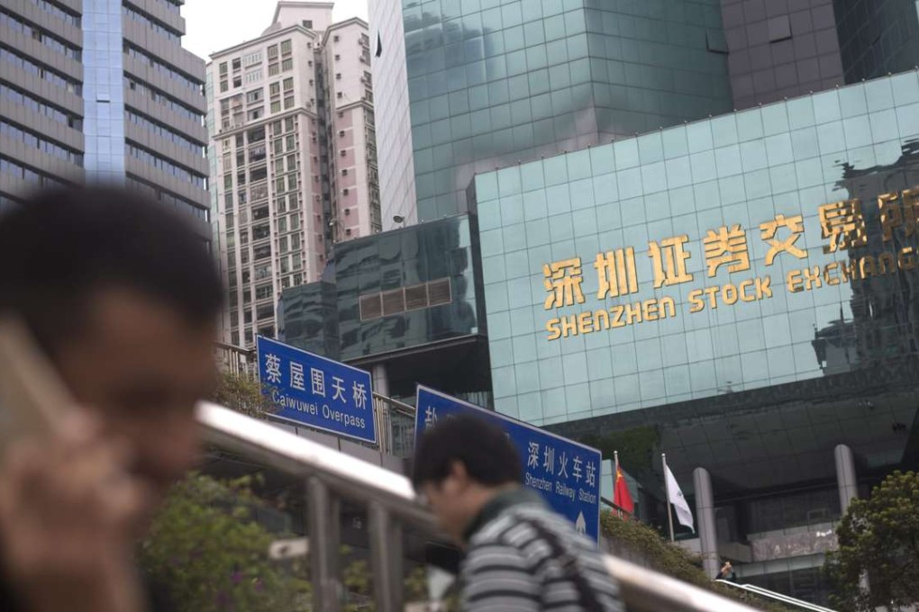 Foot traffic outside the Shenzhen stock exchange on March 9, 2016. Photo: EPA