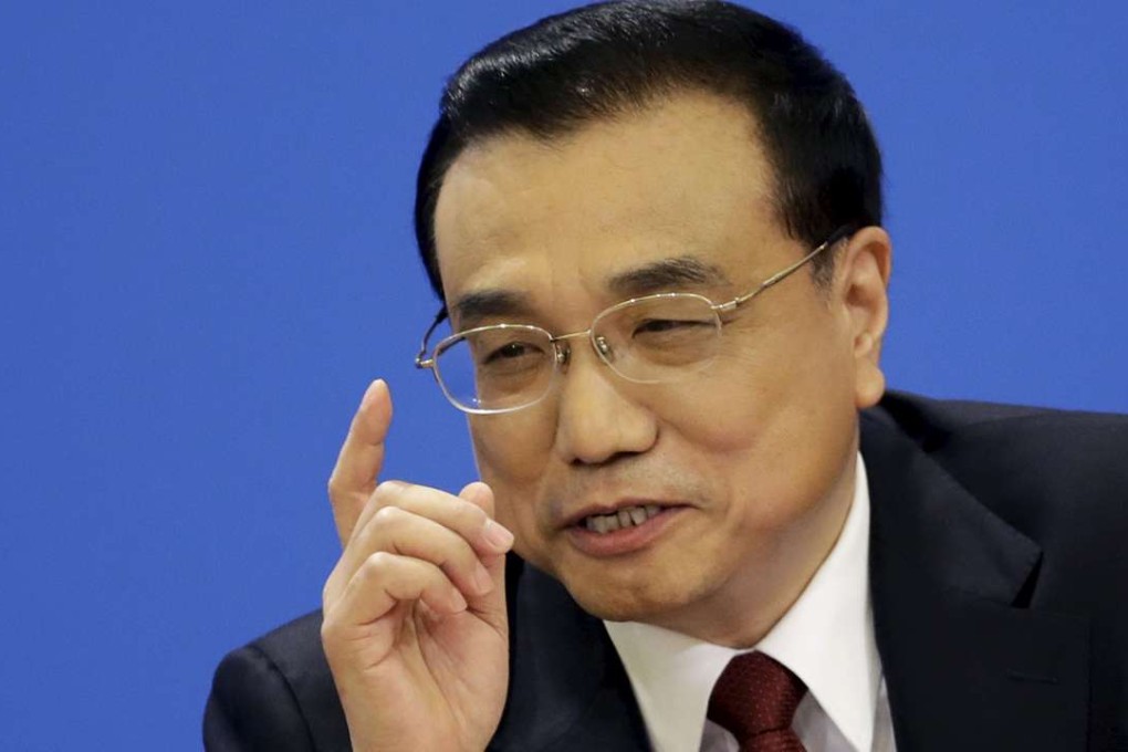 China's Premier Li Keqiang gesturesat during his press conference at the Great Hall of the People in Beijing on Wednesday. Photo: Reuters