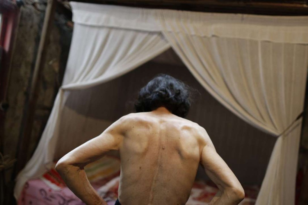 A generic photo of a person standing over his bed at home. Chen found the man who had burgled his home sleeping in his bed. Photo: Reuters
