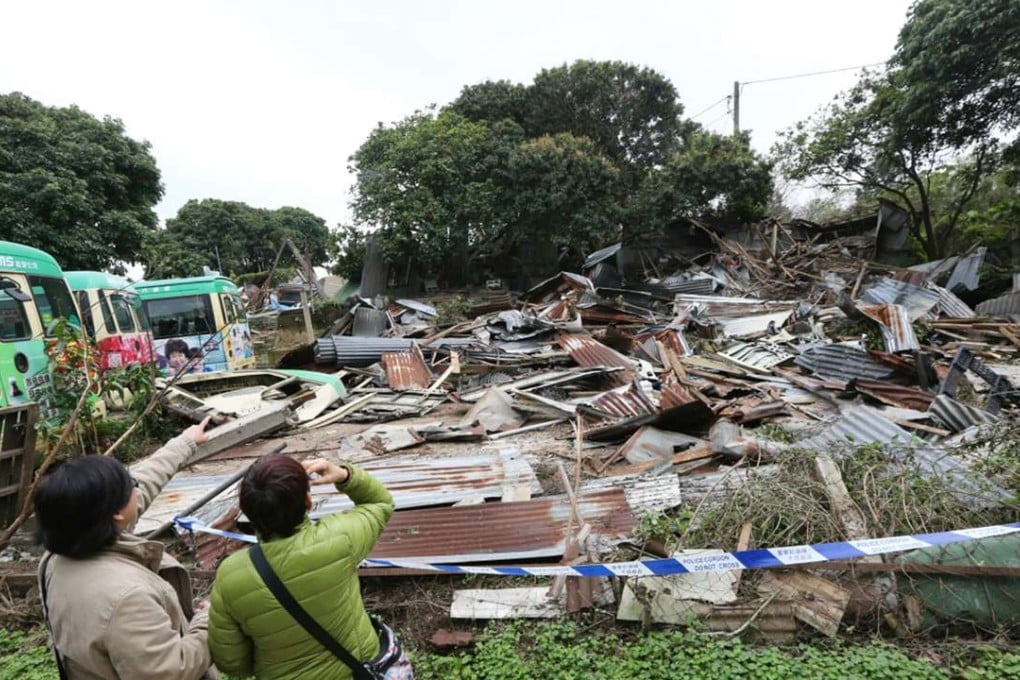 The squatter huts were reduced to piles of metal sheets and wood. Photo: Felix Wong