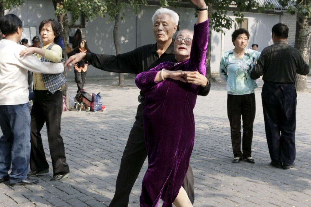 Couples dance at the Temple of Heaven park in Beijing. Premier Li Keqiang has promised China will meet its pension obligations. Photo: Reuters