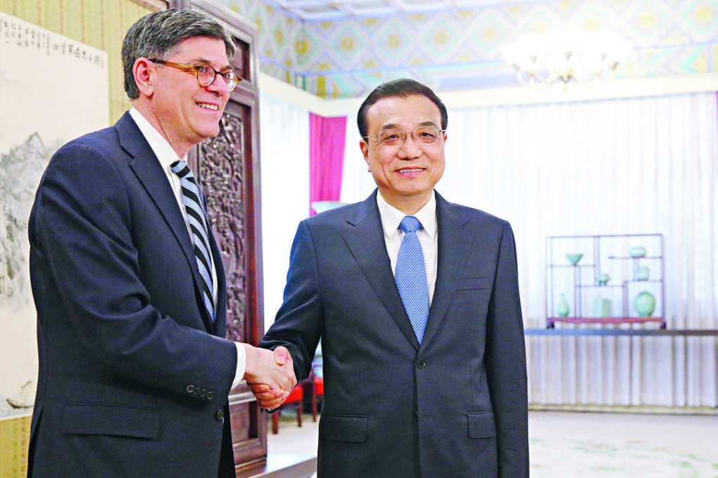 US Treasury Secretary Jacob Lew, left, shakes hands with Premier Li Keqiang in Beijing in February. Photo: AP