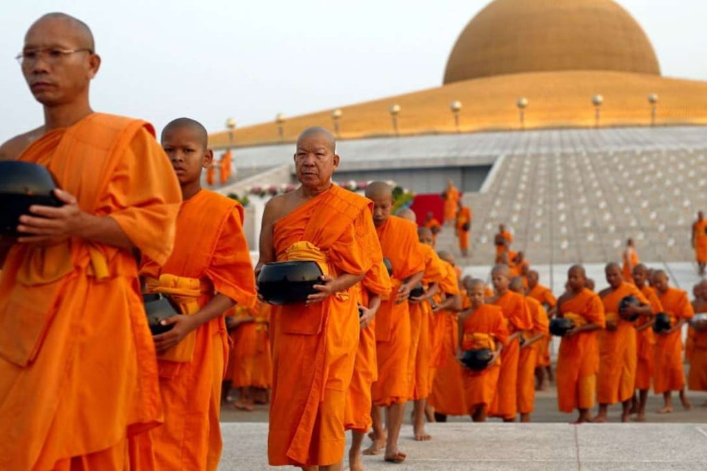 Thailand’s Channel 7 reported that he had been blessed with a new monk name that translates to ‘He Who Has Diamond Knowledge’. Photo: EPA