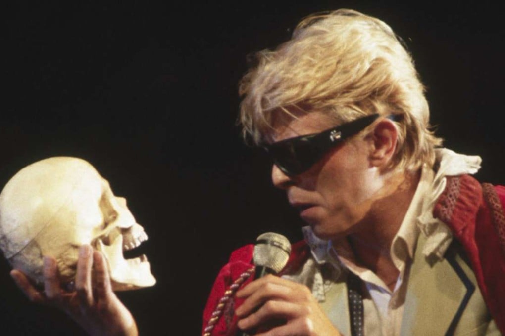 Bowie making a reference to Shakespeare’s Hamlet during the “Serious Moonlight” tour in the 1980s. Bowie was a constant reader and brought his reading into all aspects of his work. Photo: Corbis