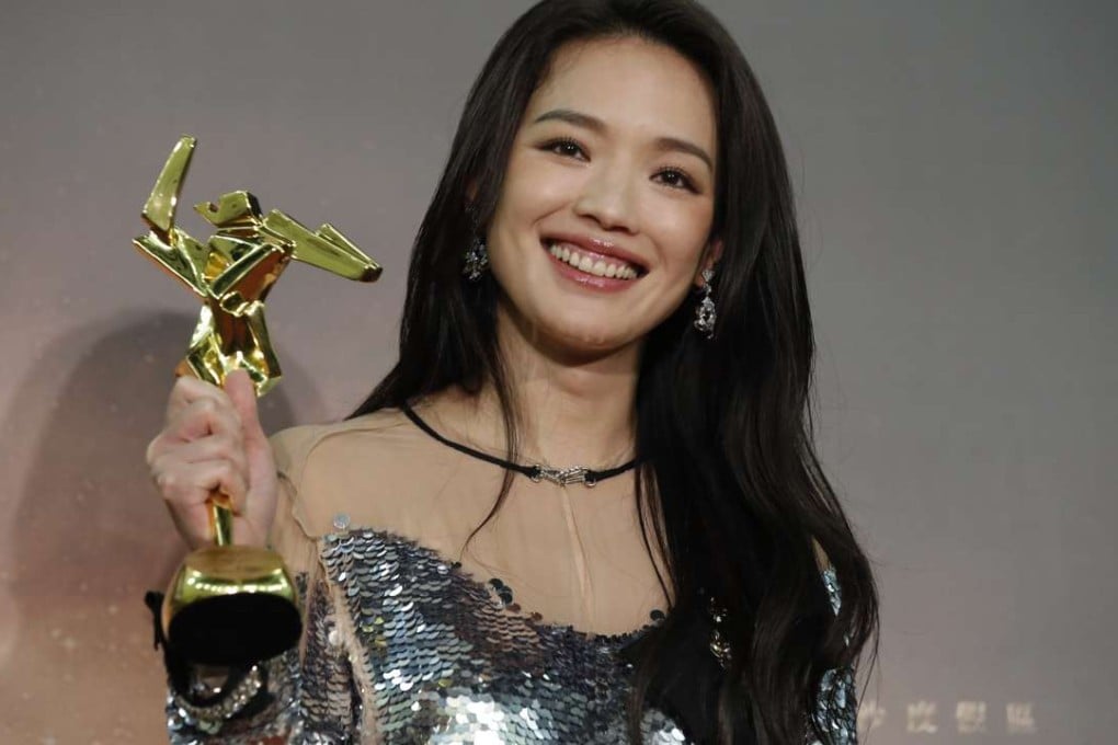 Taiwanese actress Shu Qi poses after winning the Best Actress awards of the Asian Film Awards in Macau, Thursday, March 17, 2016. (AP Photo/Kin Cheung)