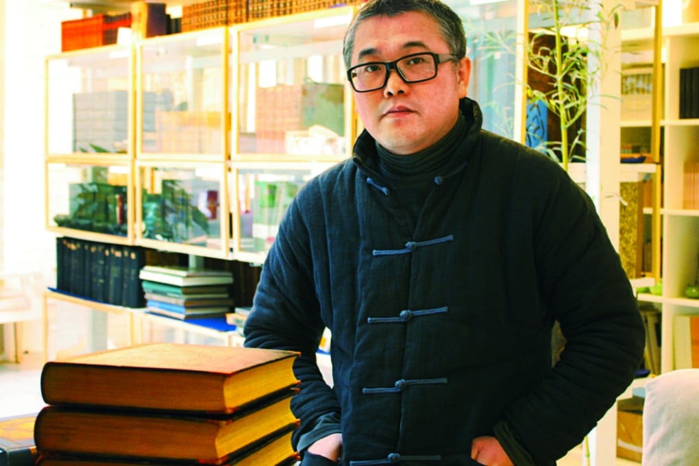 Zhang Yehong, who owns Beepub Bookstore, in Beijing, plans to turn a new page by opening a shop that focuses on old books. Photo: Laura Zhou