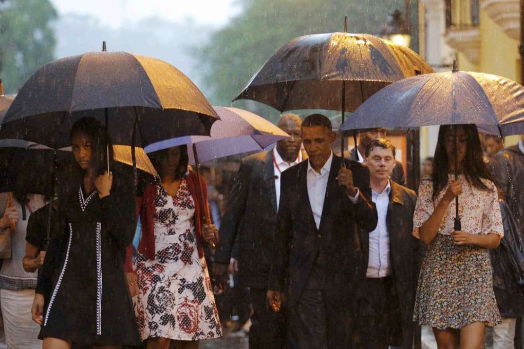 US President Barack Obama tours Old Havana with his family at the start of a three-day visit to Cuba on Sunday. Photo: Reuters